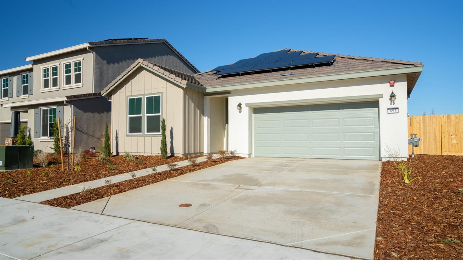 a view of house with garage