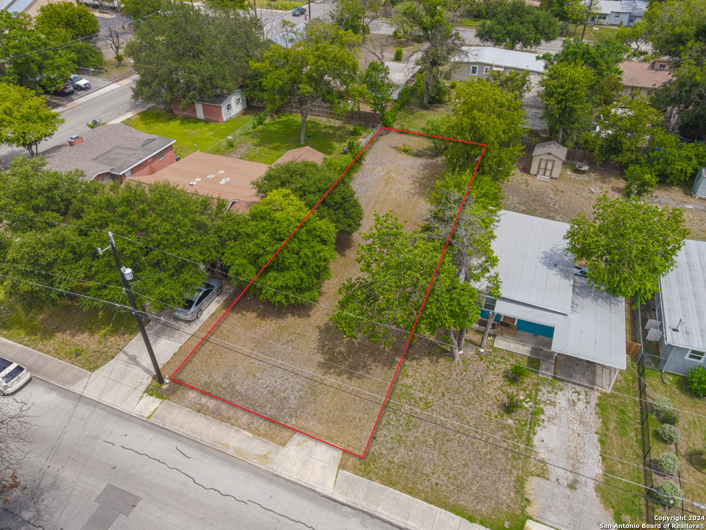 an aerial view of residential house with outdoor space