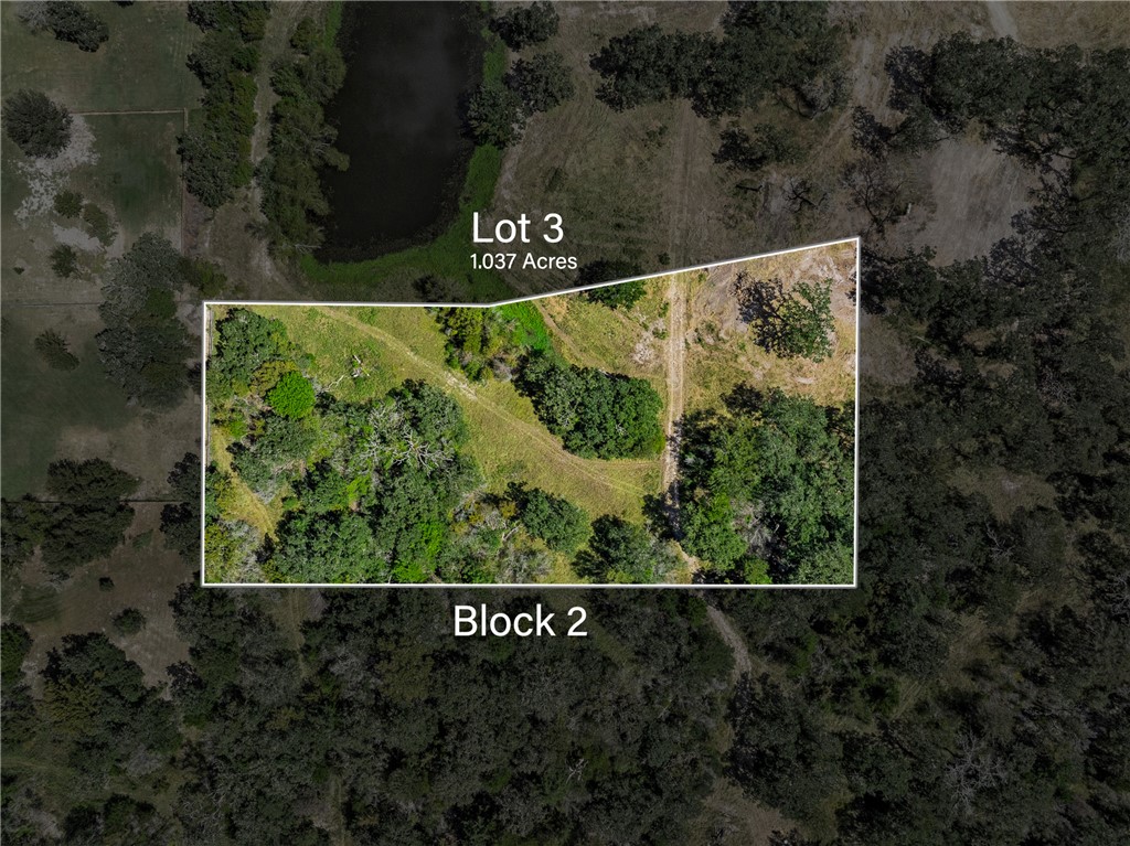 WOODED LOT next to community pond - Property bound