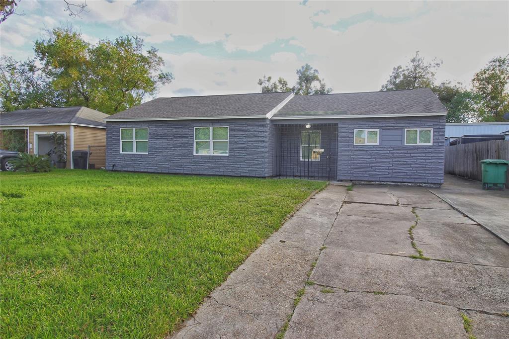 a front view of a house with yard