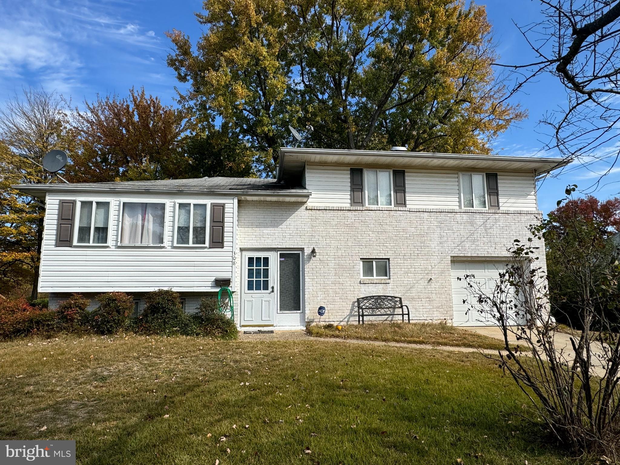 a house view with a garden space