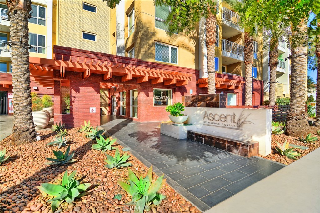 a view of a building with sitting area