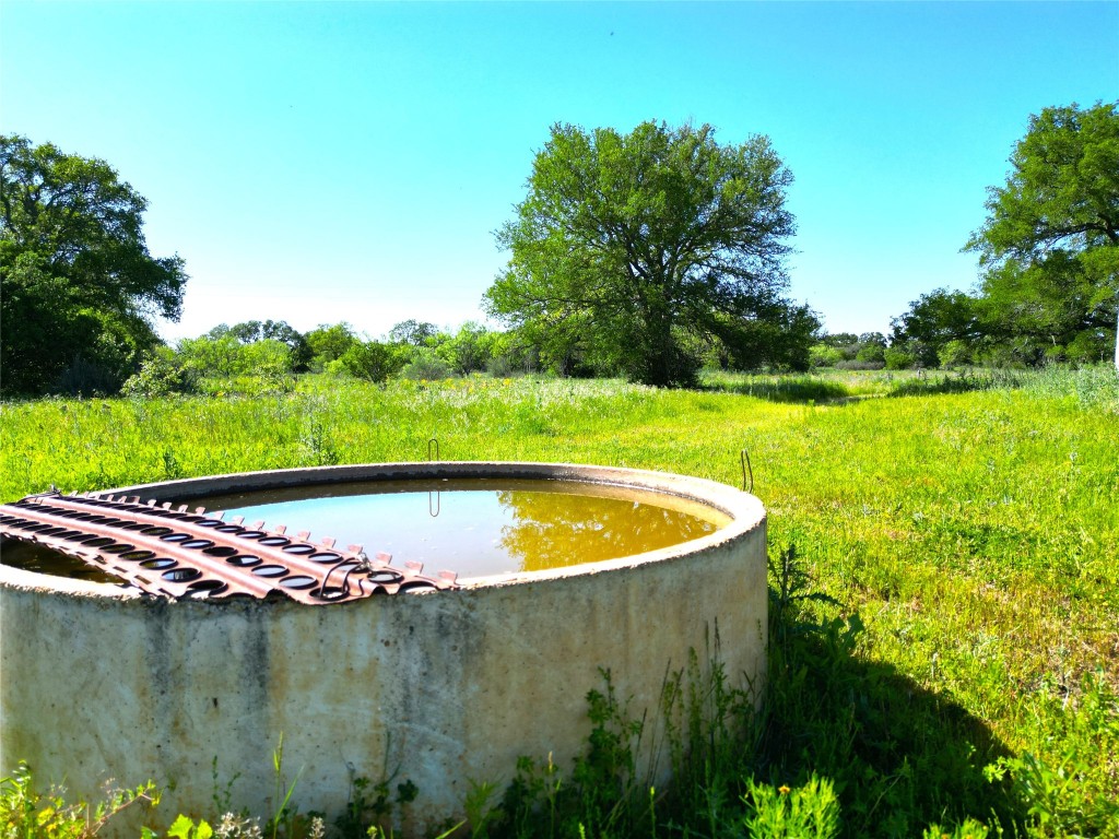 a view of a swimming pool and a lake