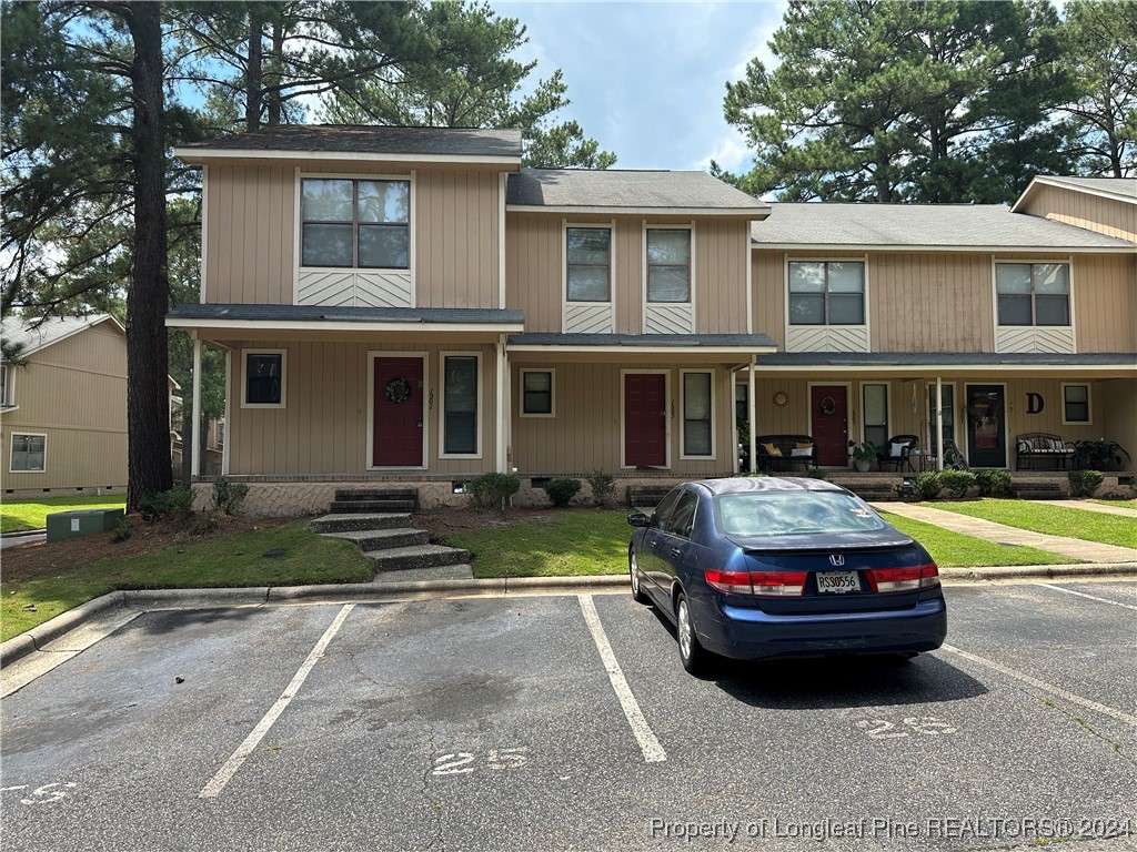 a car parked in front of a house