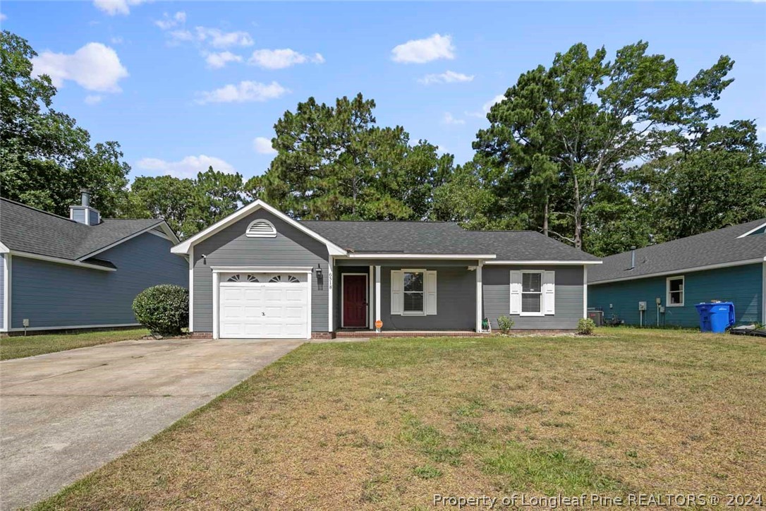 front view of a house with a yard