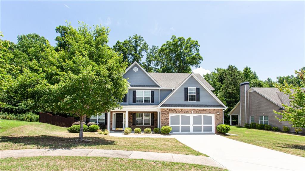 front view of a house with a patio