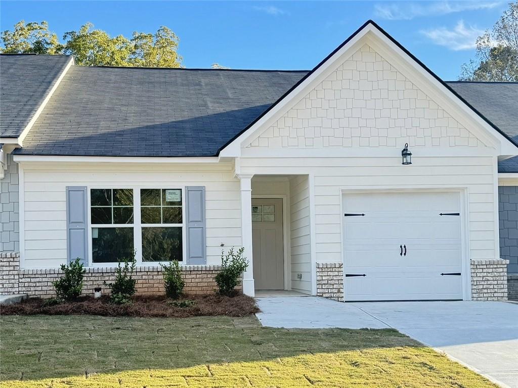 a view of house with yard