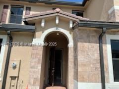 a front view of a house with entryway