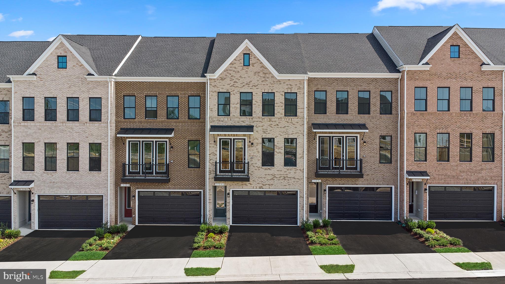 a front view of a house with yard