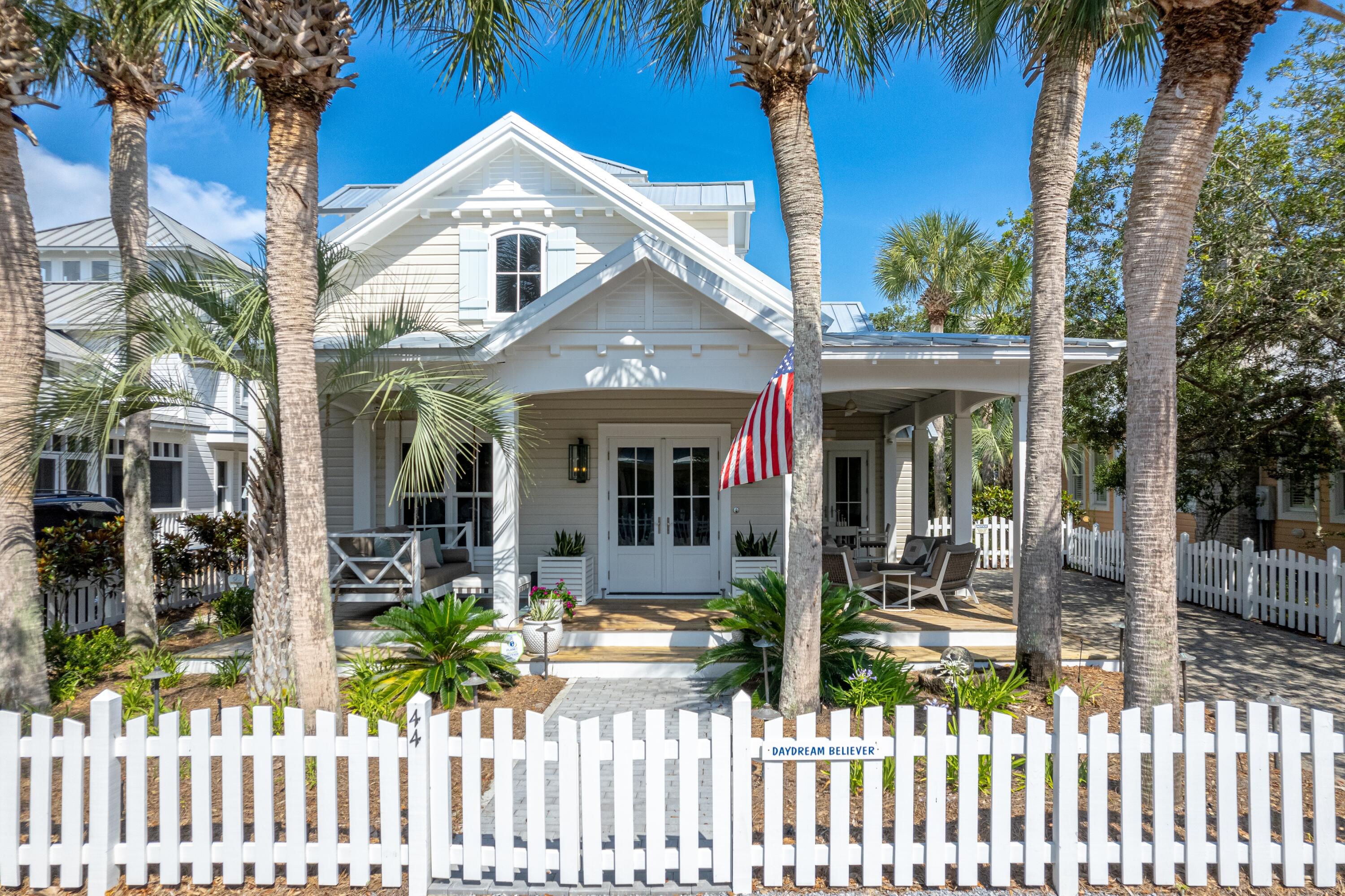 a front view of a house with a porch