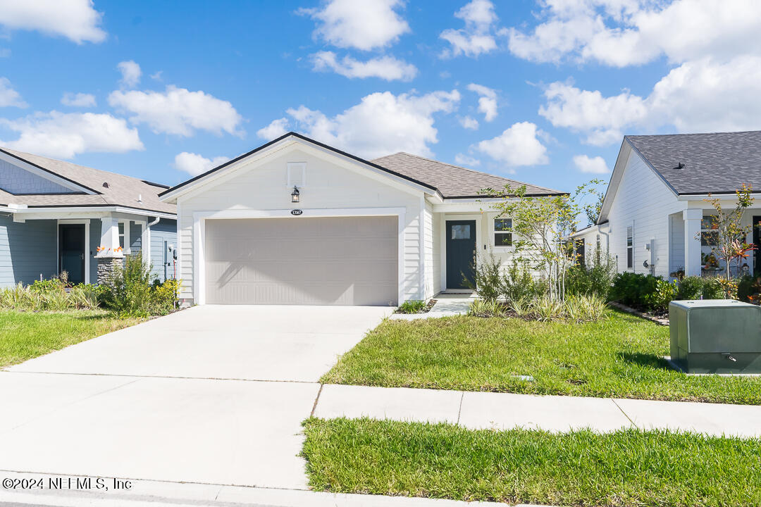 Front of house with 2 car garage