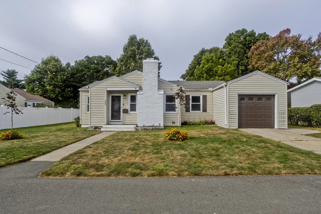 front view of a house with a yard