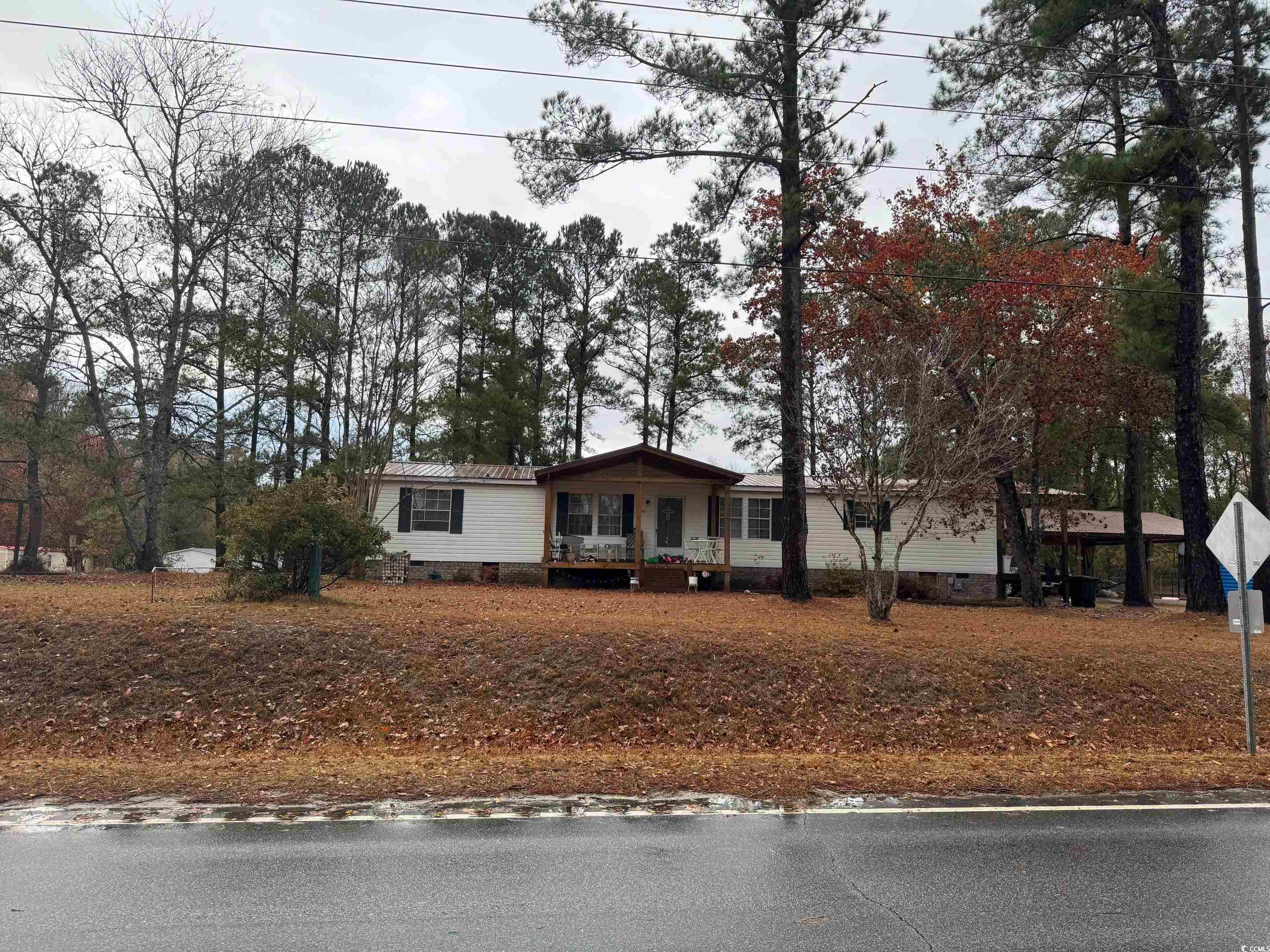 Single story home featuring a porch