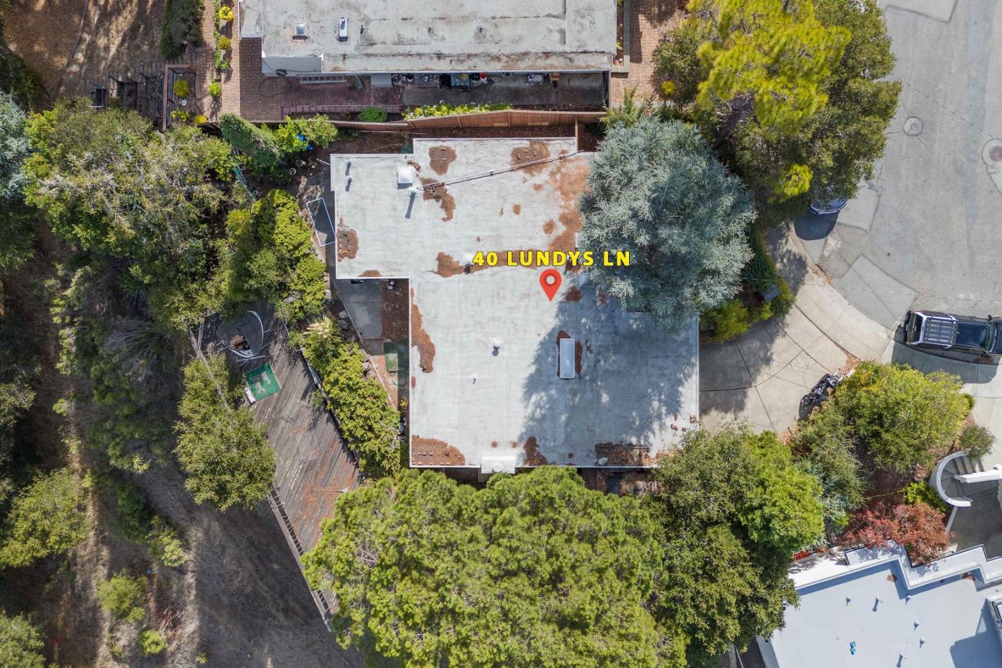 an aerial view of multiple house with outdoor space