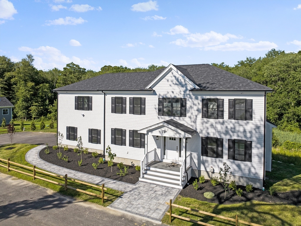 front view of a house with a patio