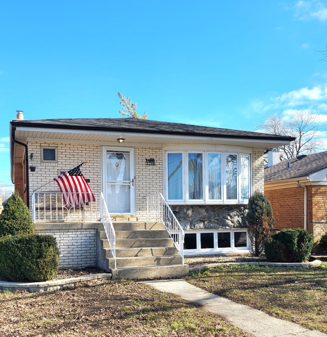 front view of a house with a street