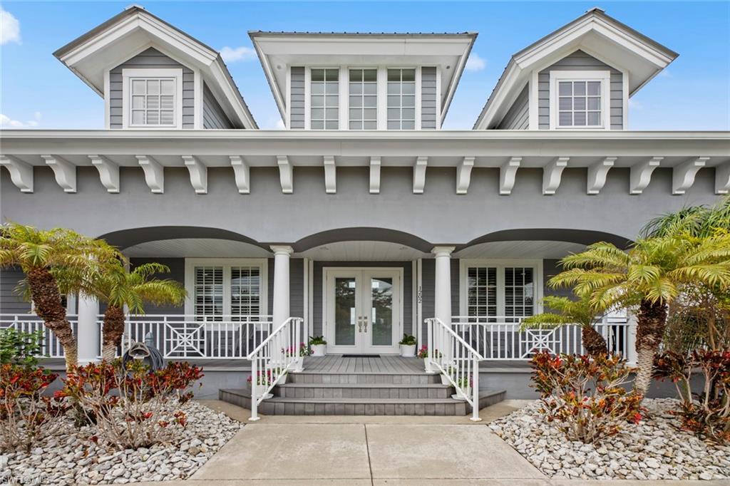 a front view of a house with a porch