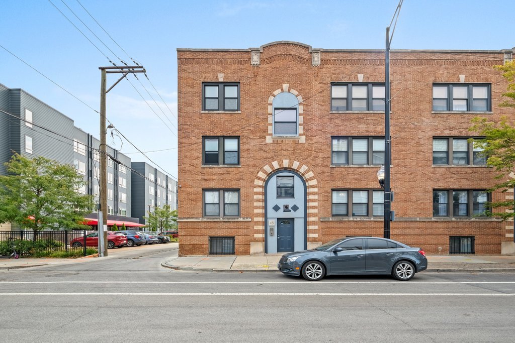 a car parked in front of a building