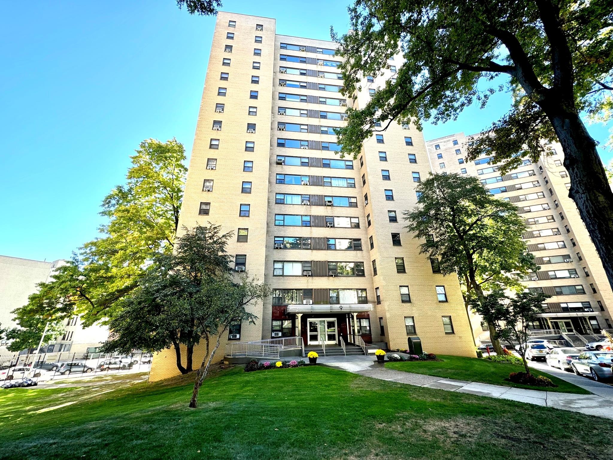 a view of building with yard