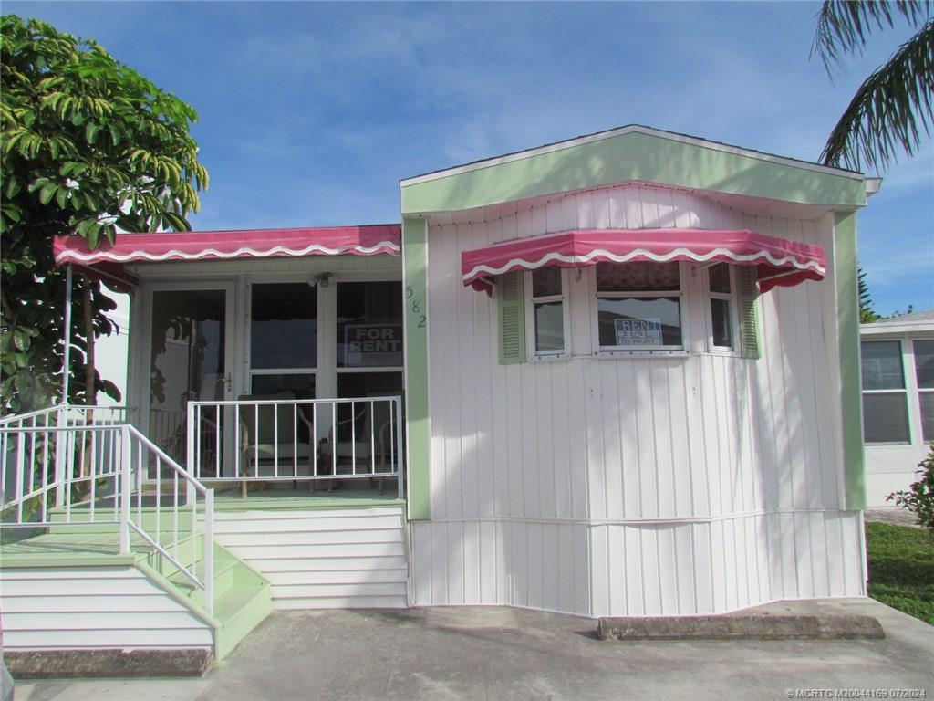 a view of a house with a porch