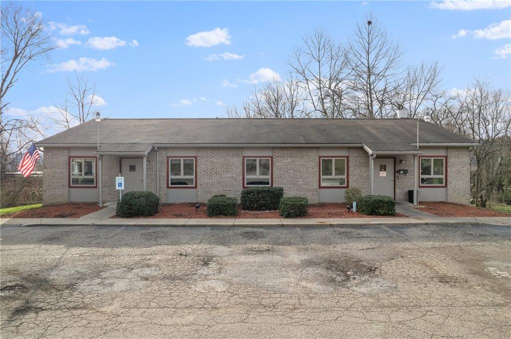 front view of a house with a patio