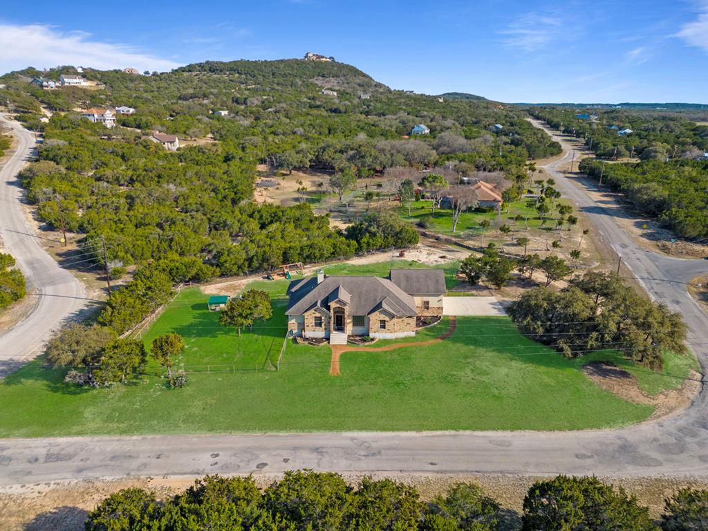 an aerial view of a house with a garden