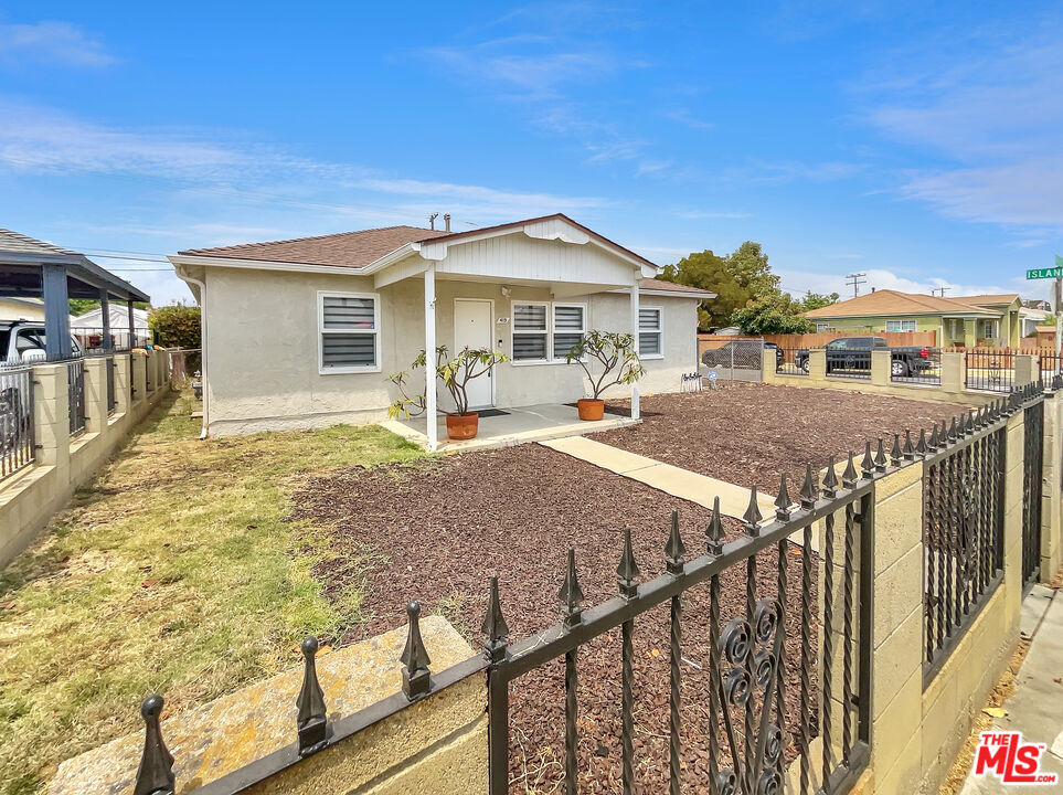 a front view of a house with yard