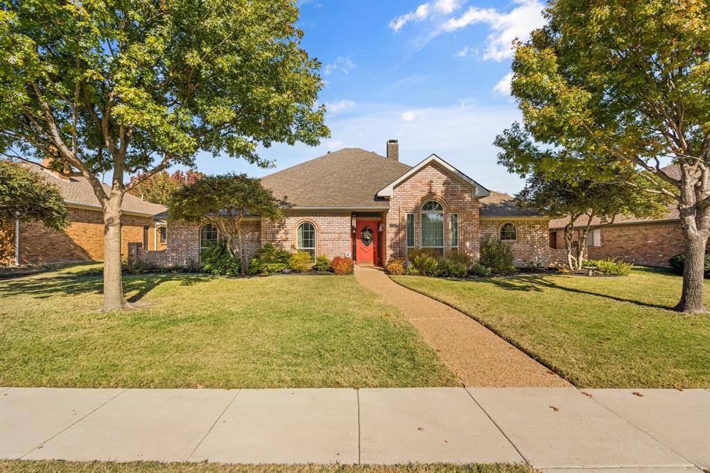 a front view of house with yard