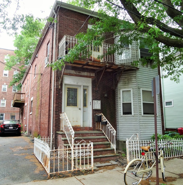 a view of a house with a patio