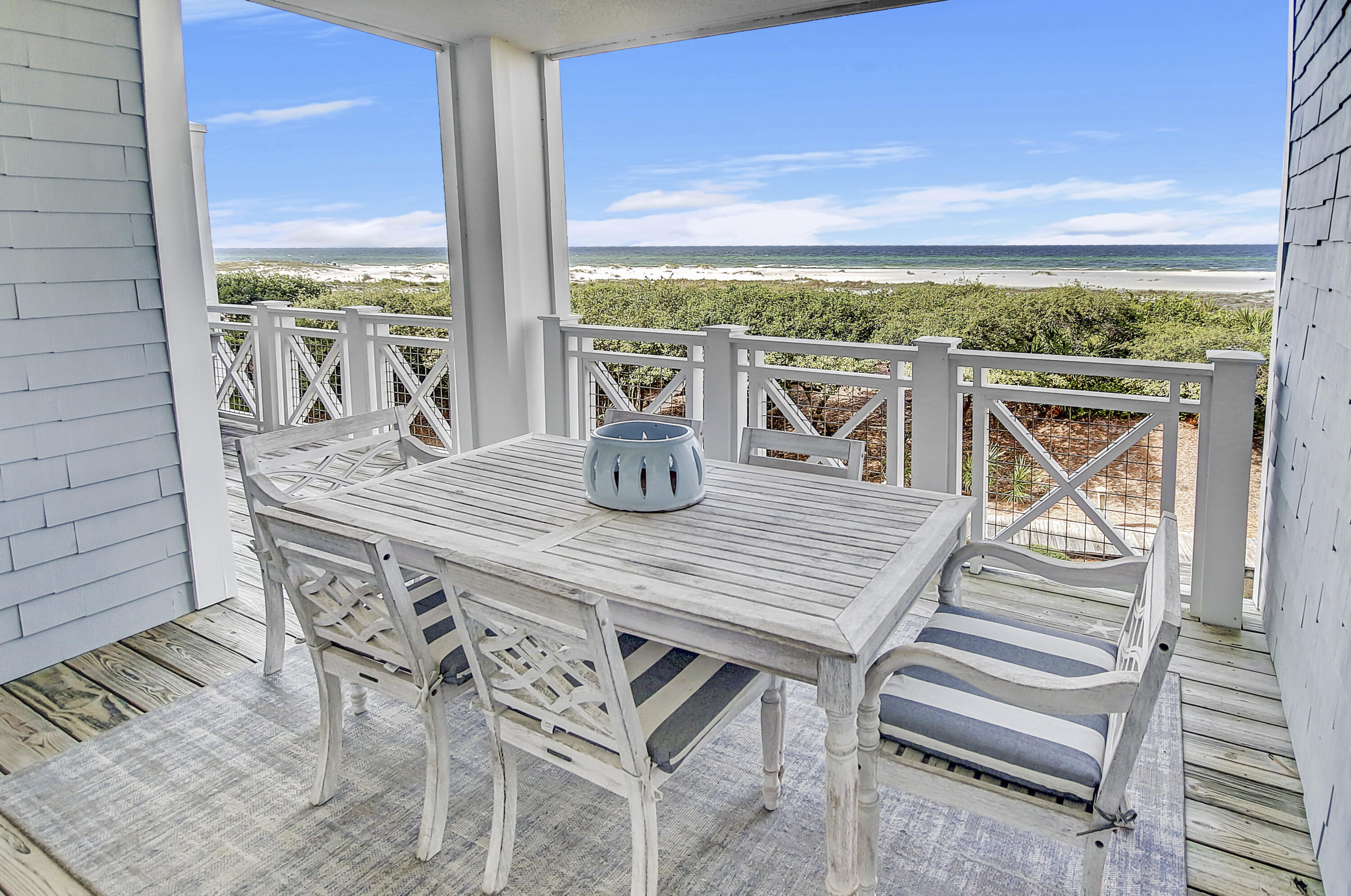 a view of an outdoor dining space with furniture