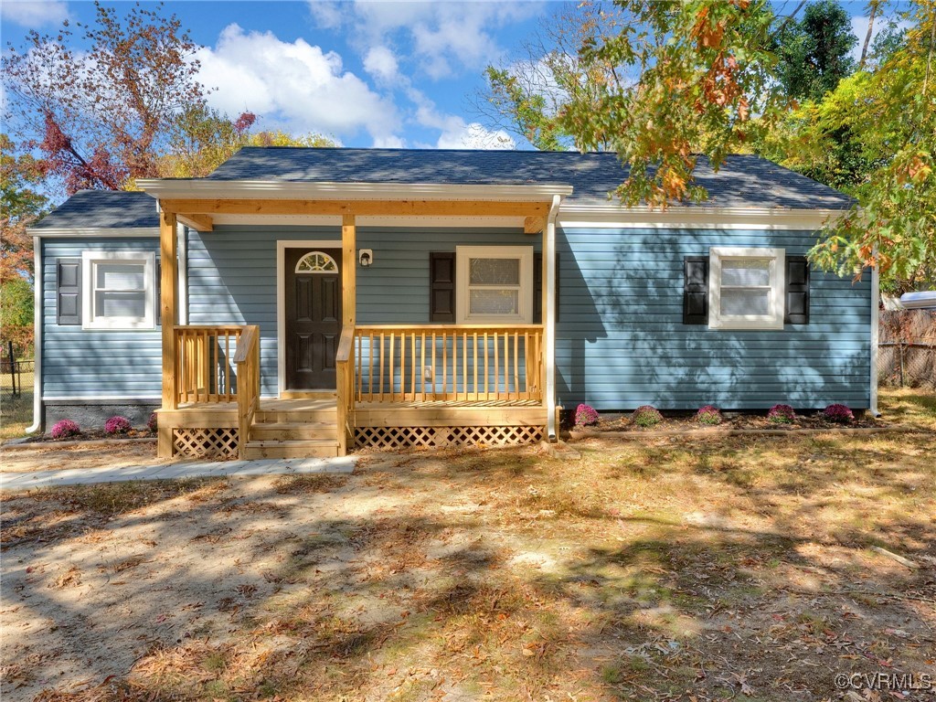 View of front of home featuring covered porch