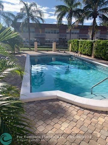 a view of a back yard of the house