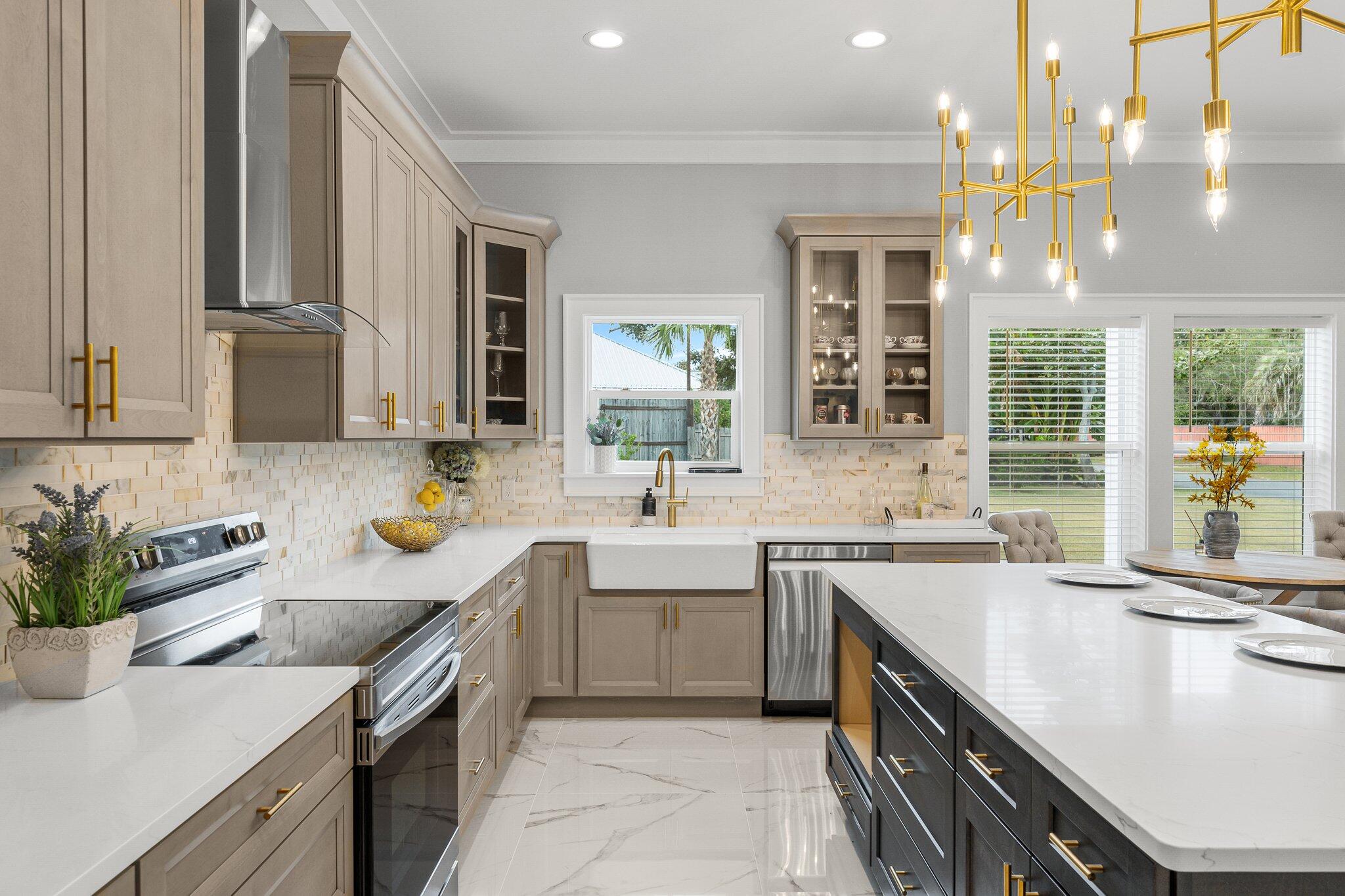 a kitchen with a sink stove top oven and cabinets