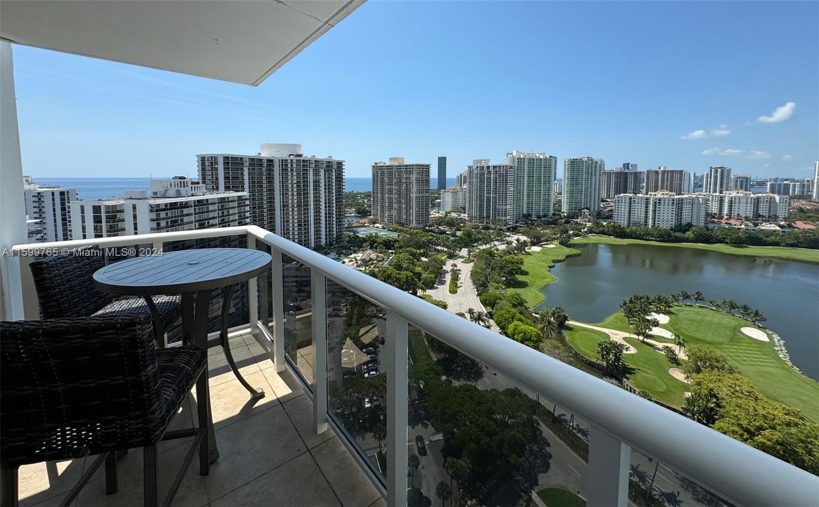 a view of a city skyline from a balcony