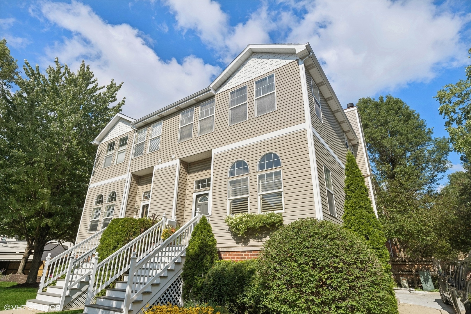 a front view of a house with a yard