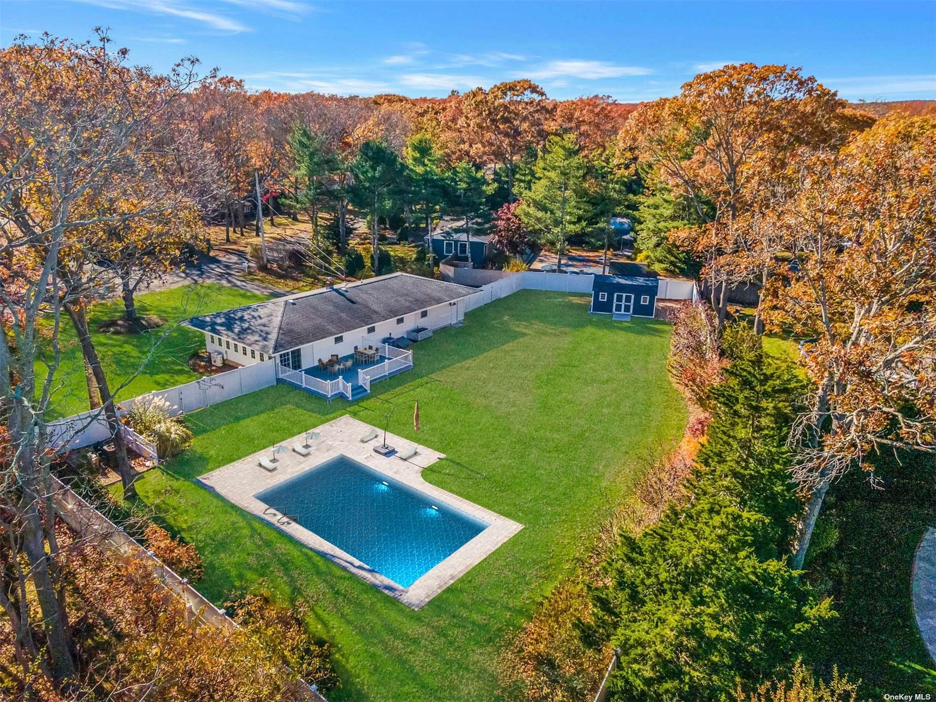 an aerial view of a house with a garden