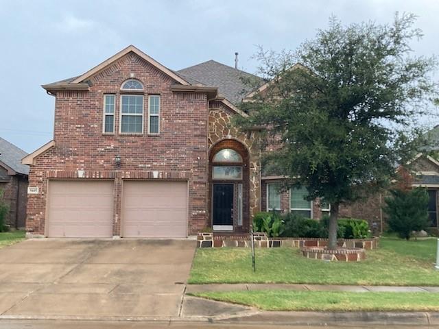 a front view of house with yard