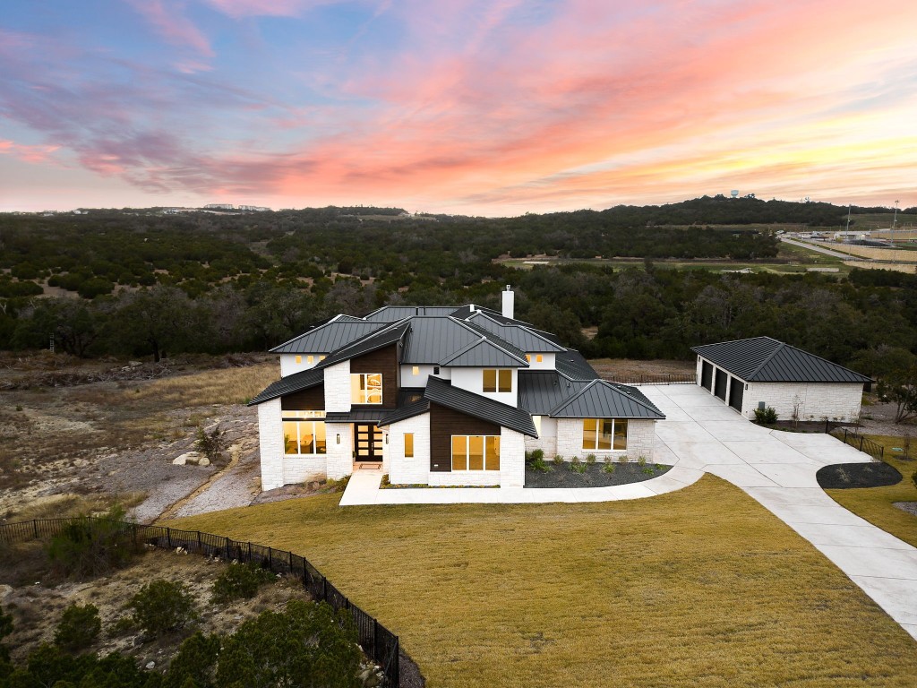 Home sits at the end of the cul de sac and backs to a wet weather creek