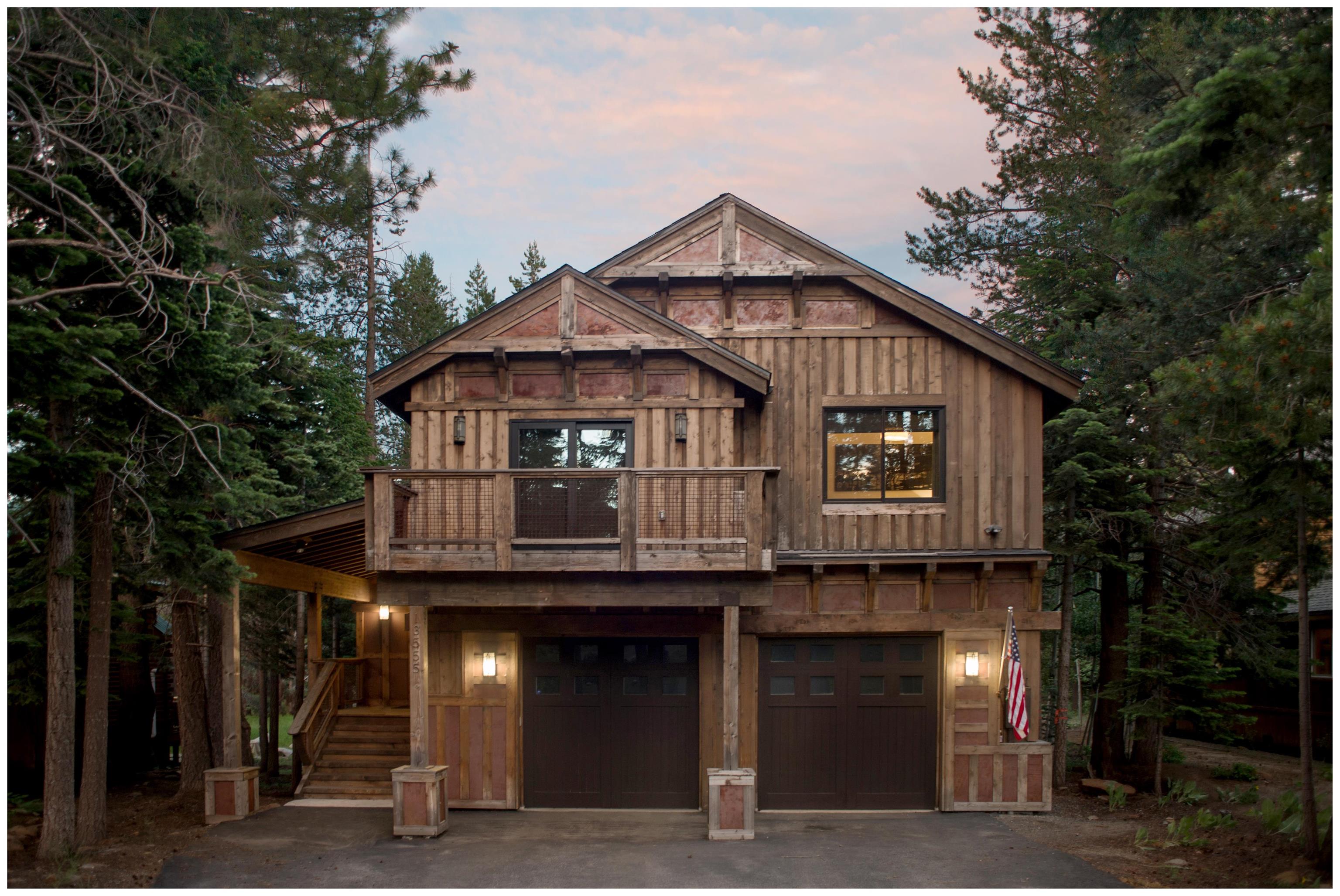 a front view of a house with garage