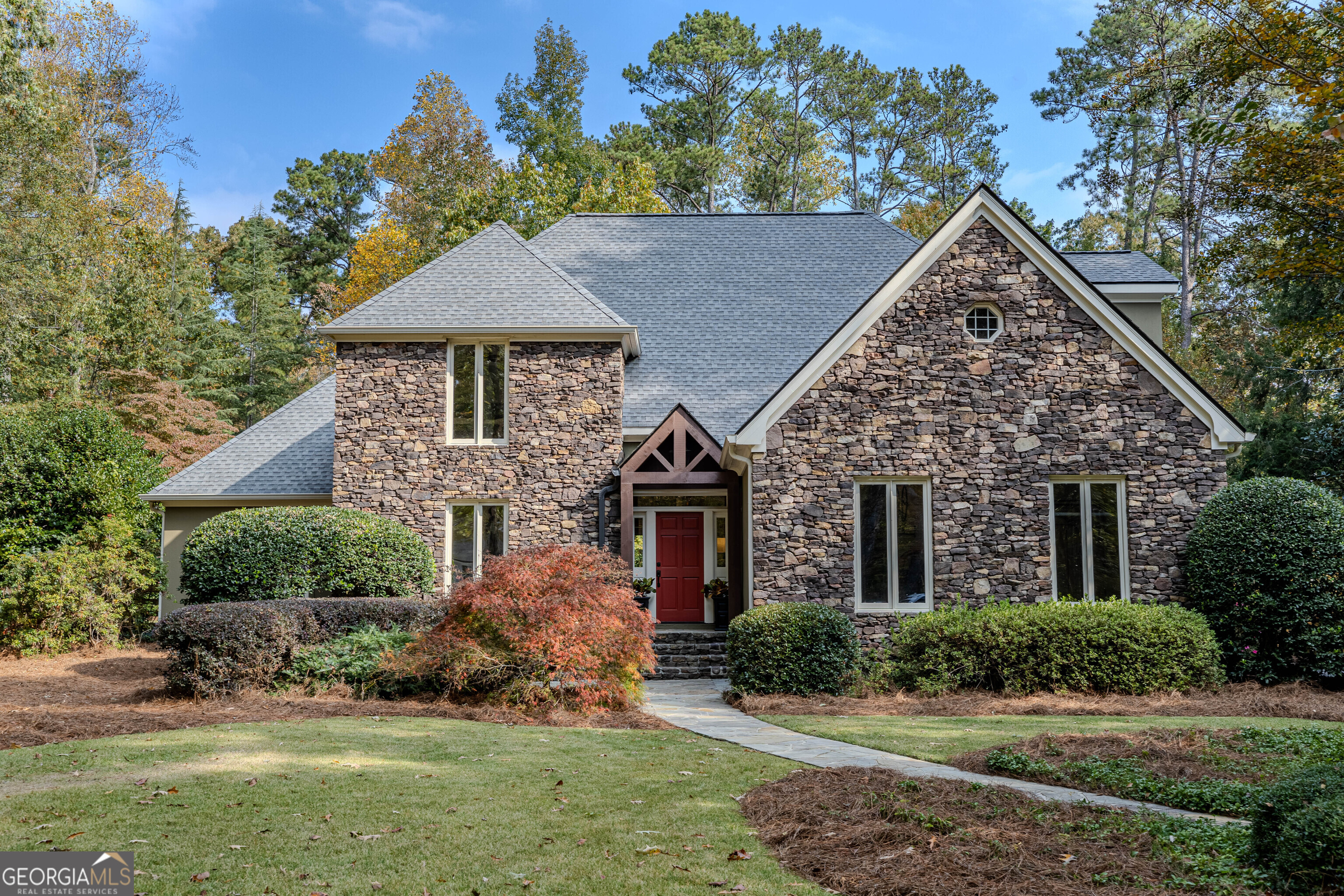 front view of a house with a yard