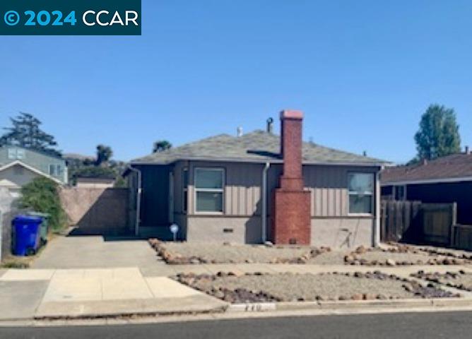 a front view of a house with a garage