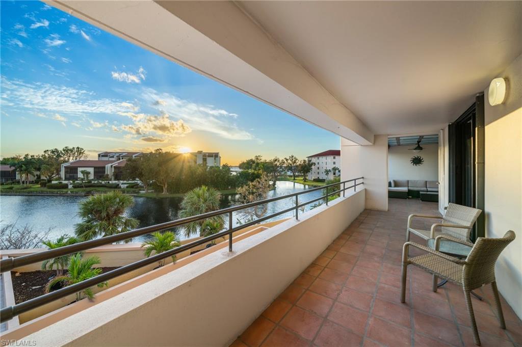 a view of a balcony with city view