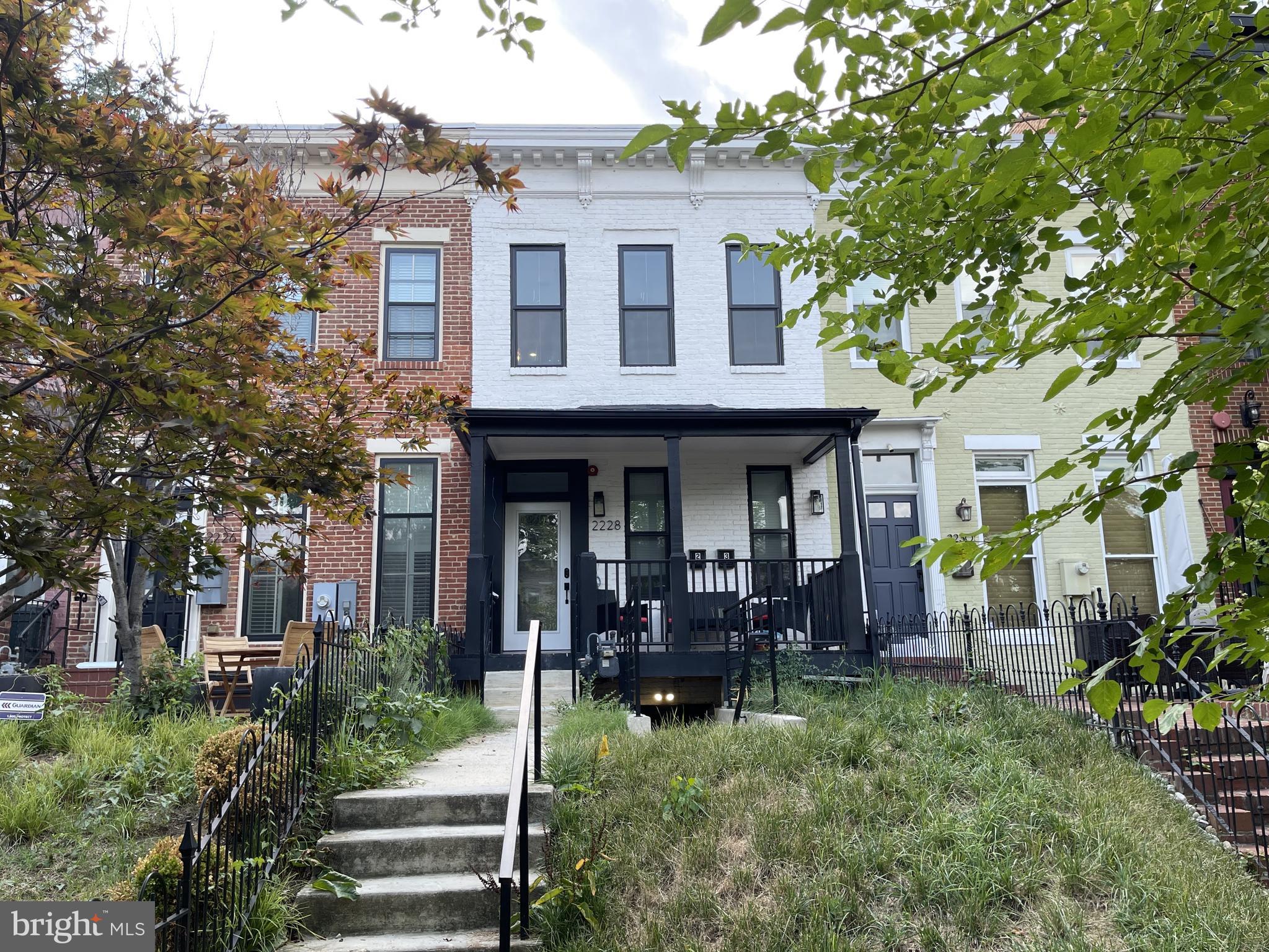 a front view of a house with porch