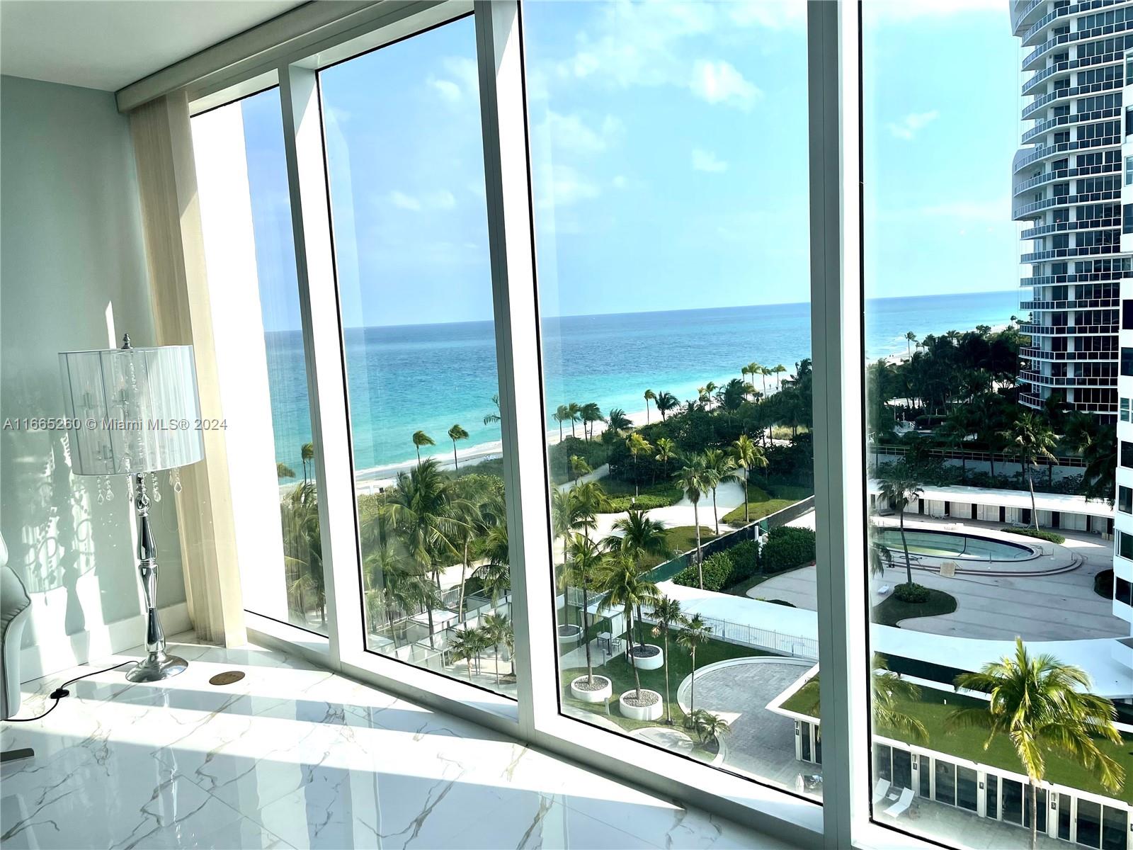 a view of a glass door and porch