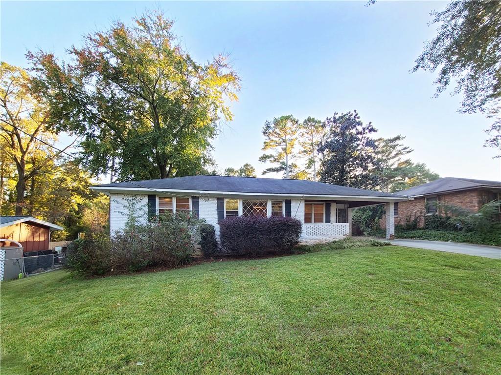 front view of house with a yard