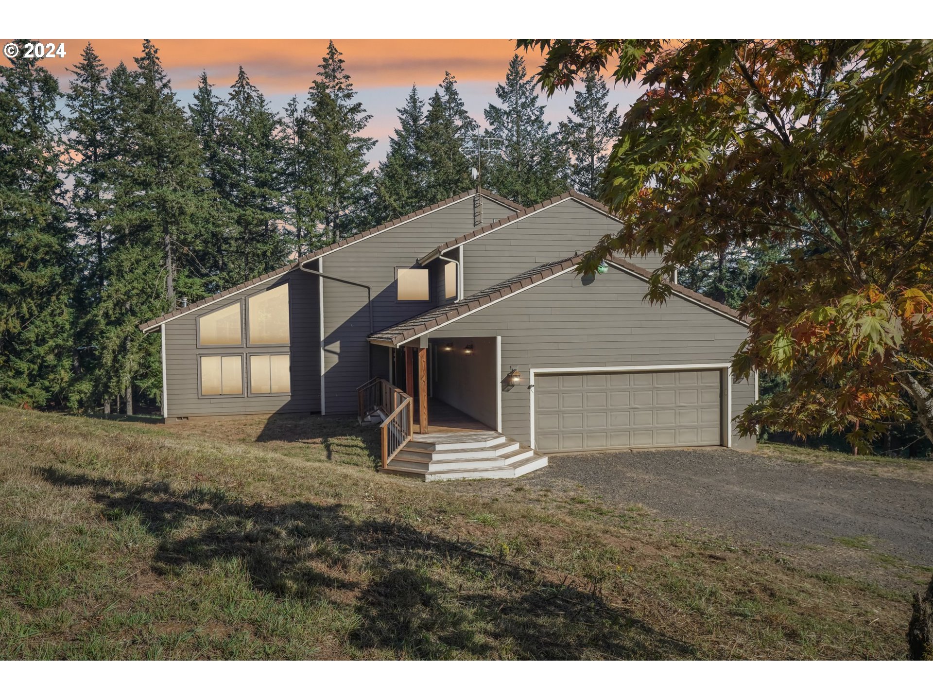 a house view with a backyard space