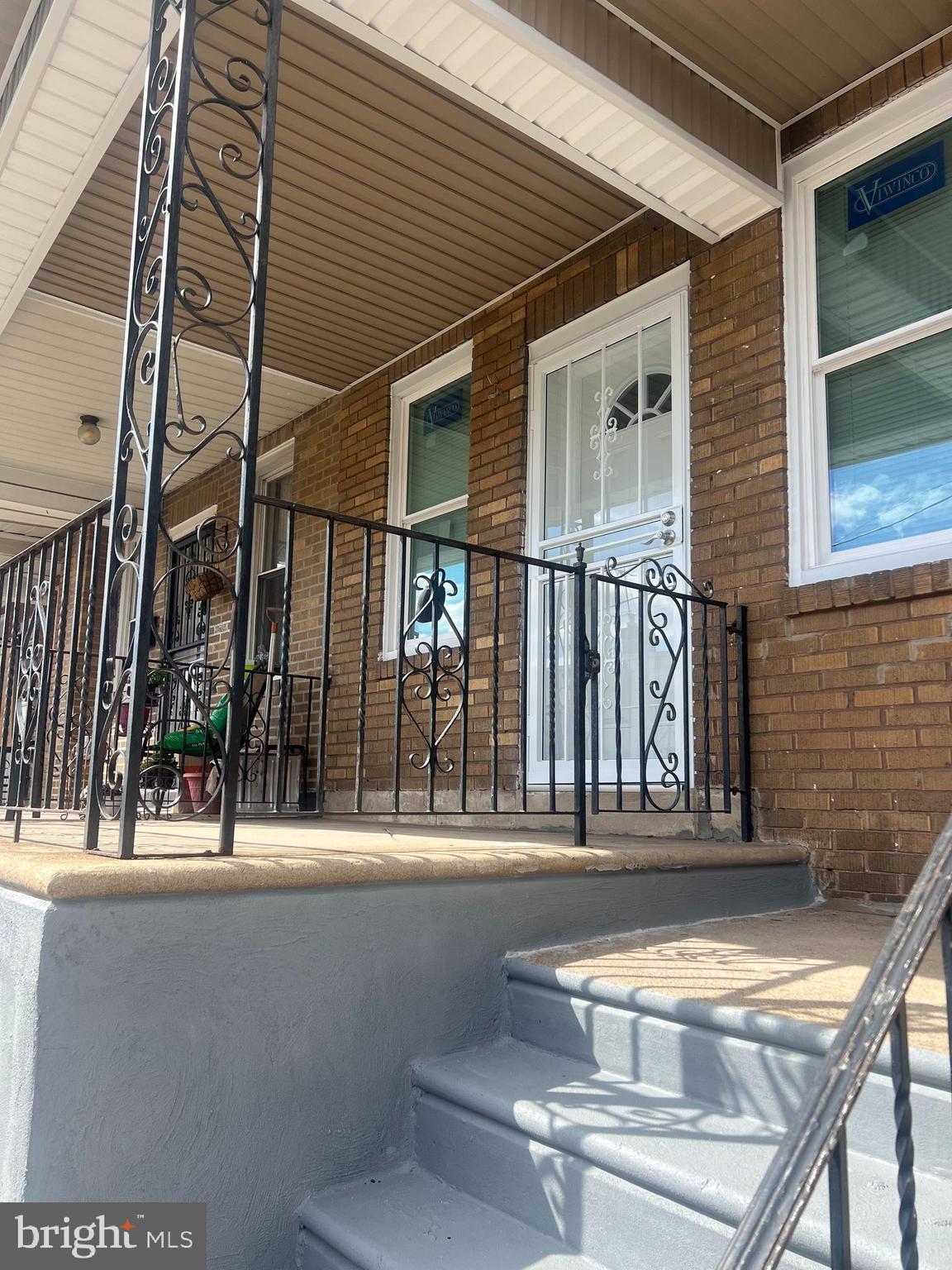 a balcony view with a outdoor seating space