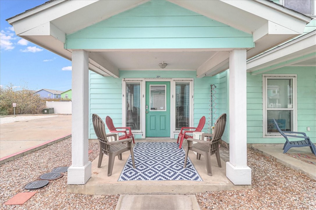 a outdoor space with patio the couch and glass door