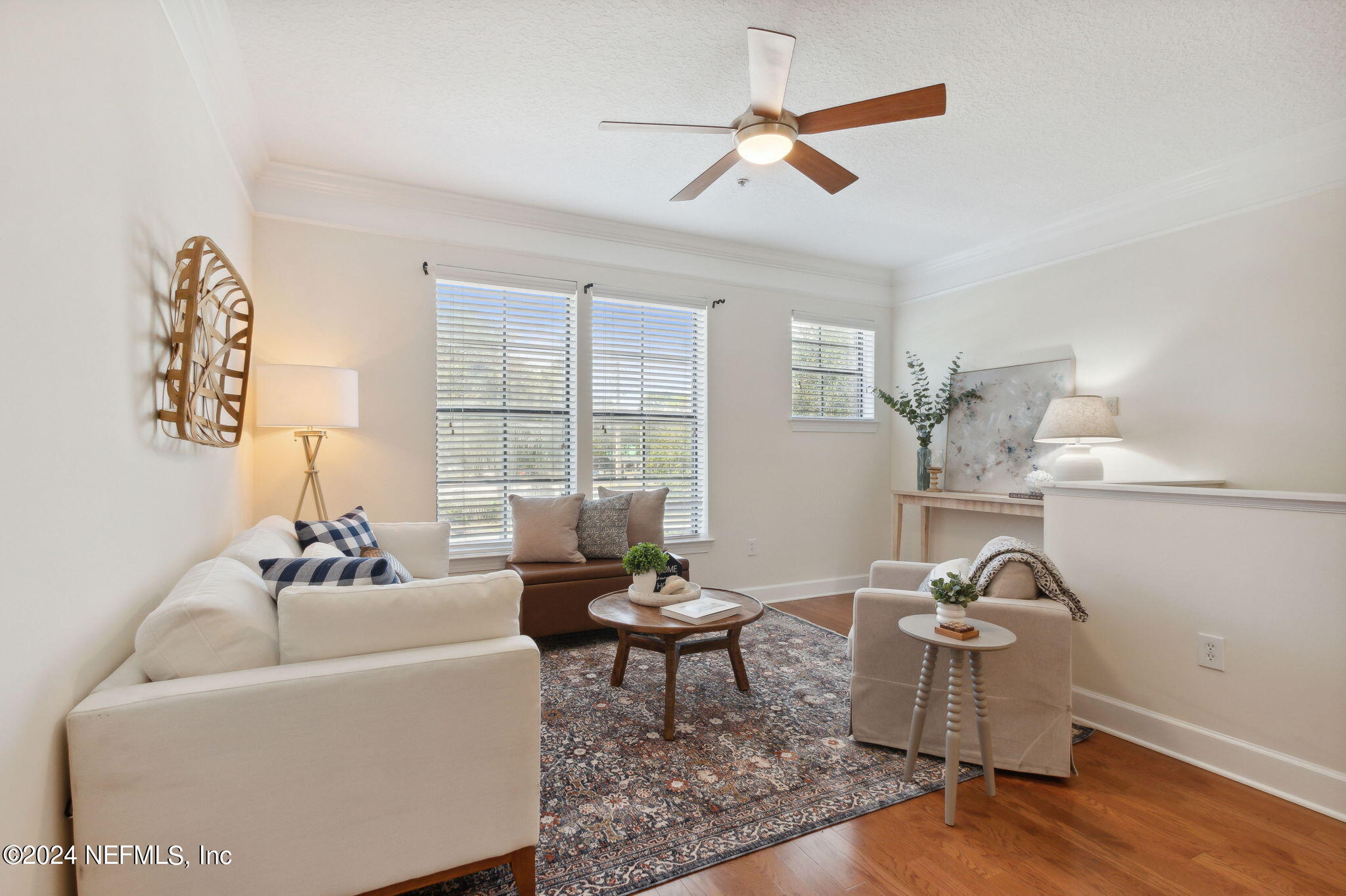 a living room with furniture and window