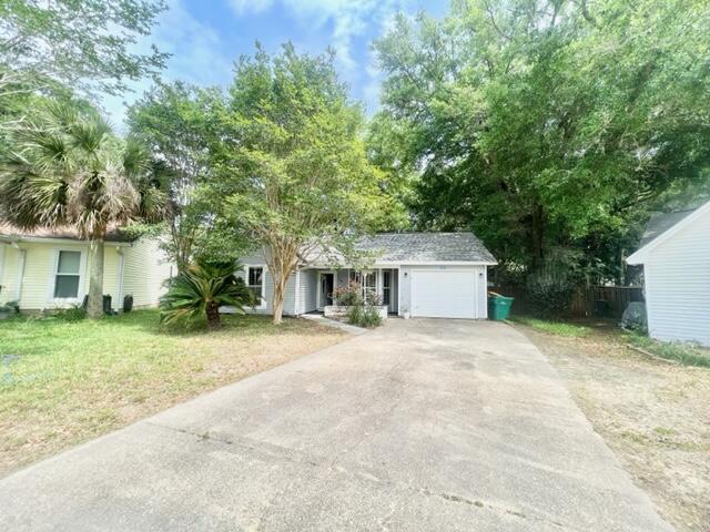 front view of a house with a trees